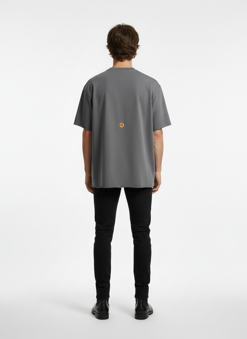 Model with back to camera wearing gray t-shirt